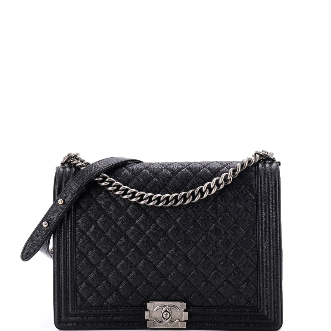 Chanel Boy Flap Bag Quilted Caviar: Twelve inches across is as wide as this line runs, and at 12 by 7 by 3 inches the caviar body here is a tote in flap-bag clothing, stable on its flat base and unbothered by weight. A 19.5-inch strap i