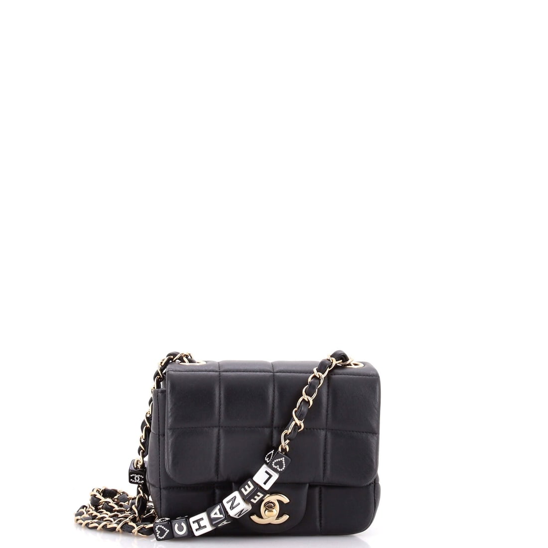 Chanel Monacoco Logo Blocks Square Flap Bag Quilted Lambskin with Resin: Resin hardware at Grade C - Very Good calls for a careful look at the blocks themselves, since chips there are the usual issue. The square body measures 6 by 5 inches and 3 deep, boxy enough to sit up