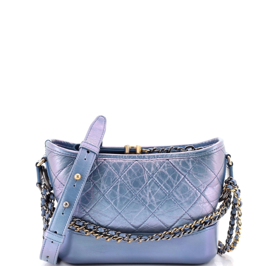 Chanel Gabrielle Hobo Quilted Iridescent Lambskin: A shimmer finish over quilted lambskin is the only real difference between this Gabrielle Hobo and its calfskin counterparts, and it moves the bag from daytime to after dark. Standard proportions appl