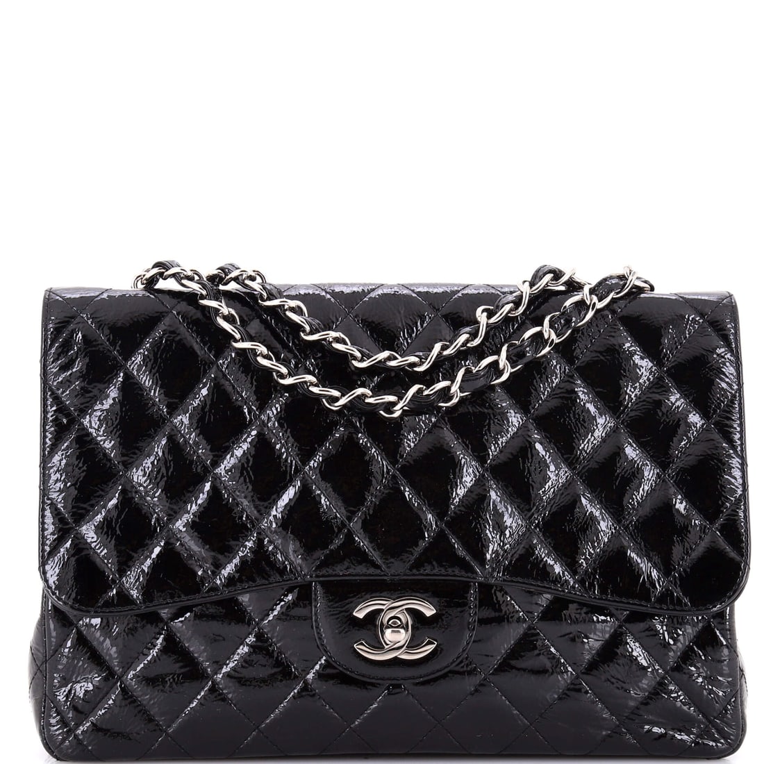 Chanel Vintage Classic Single Flap Bag Quilted Patent: Gloss is the argument for a patent flap: light moves across the diamond quilting in a way matte leather cannot. This one runs 11.5 wide by 8.5 high with a 4 in depth, generous by classic flap standard