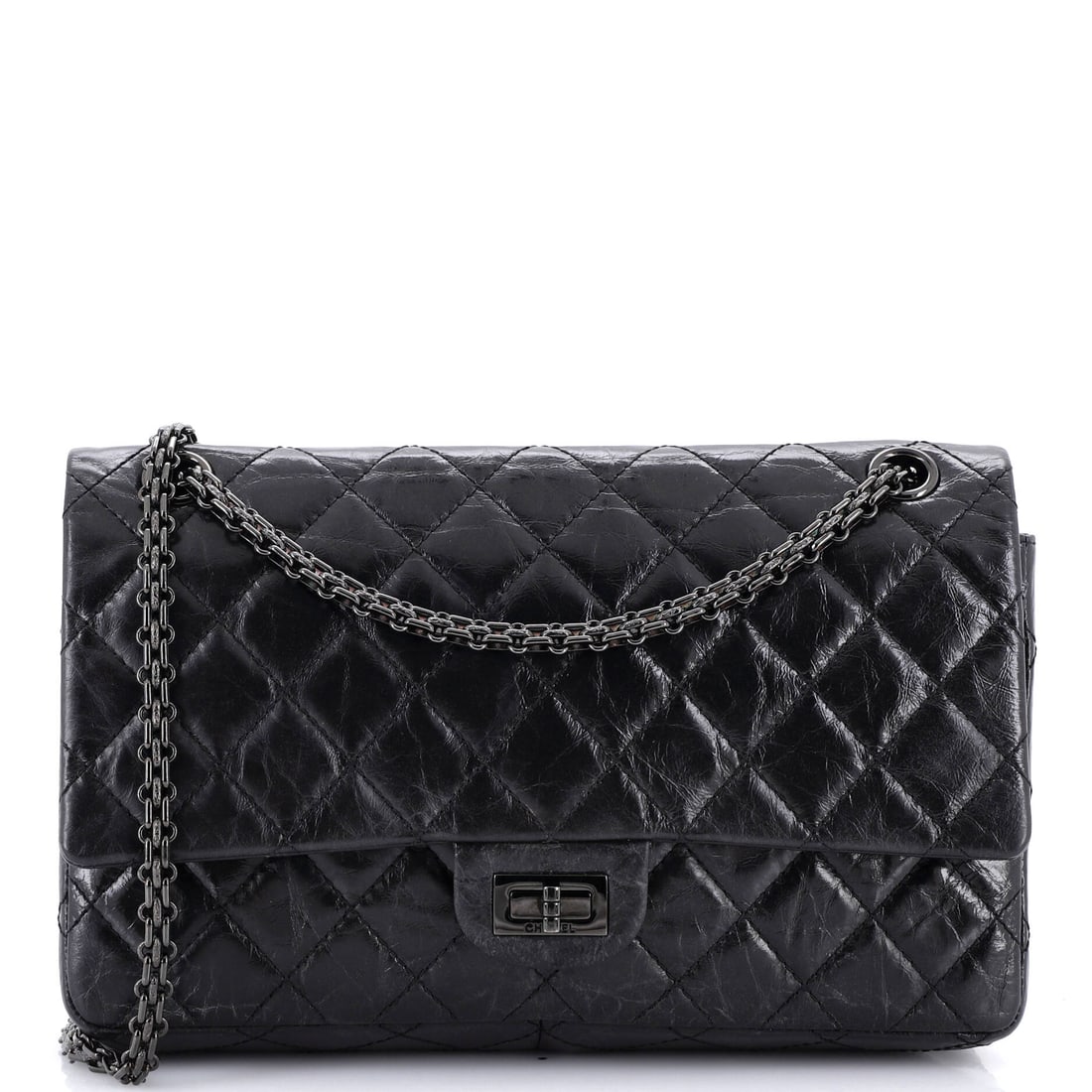 Chanel So Black Reissue 2.55 Flap Bag Quilted Aged Calfskin: Diamond quilting rather than chevron on a So Black Reissue keeps the classic 2.55 read while removing every point of metal contrast. Eleven inches across and 3 in deep, it is the size most bidders wil