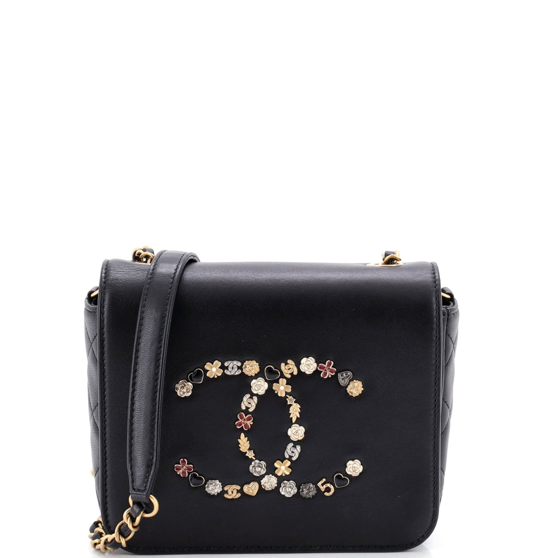 Chanel Giant Crystal CC Flap Bag Lambskin: Lambskin keeps a low profile on this flap so the giant crystal CC can take over, which at 6.5 inches wide, 5 high and 2 deep it comfortably does. Small dimensions mean a card case, phone and lipstick,