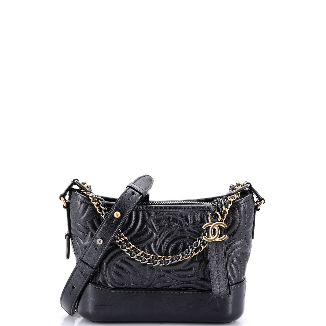 Chanel Gabrielle Hobo CC Stitched Calfskin: The Gabrielle's split personality of rigid base and collapsible top makes it sit differently on the body than any other Chanel hobo. CC stitching here replaces quilting, outlining the logo into the ca