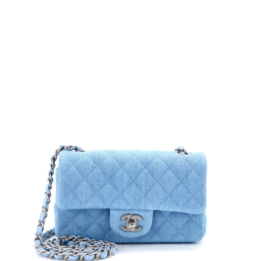 Chanel Classic Single Flap Bag Quilted Denim: Denim on a quilted flap turns the whole proposition casual, and at W 8 x H 5 x D 3 in the bag is scaled for daytime rather than dinner. The extra inch of depth over the standard small flap gives it a 
