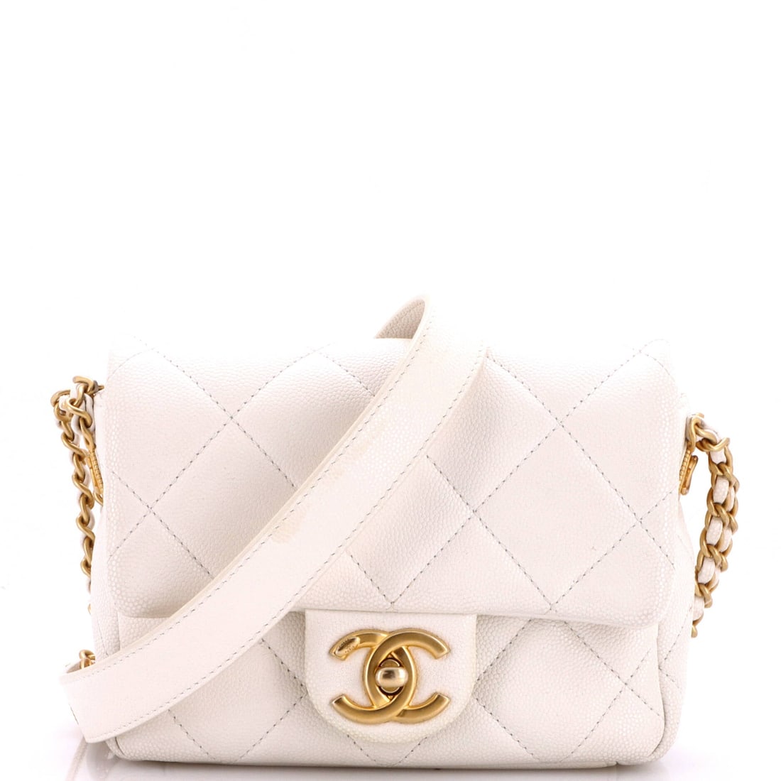 Chanel Twist Your Buttons Flap Bag Quilted Caviar: Button-twist hardware against quilted caviar, on a tight 6.5 x 5 x 2 in body that carries close and asks little. Grade C - Very Good, which makes this a bag to wear rather than to shelve. Caviar's tex