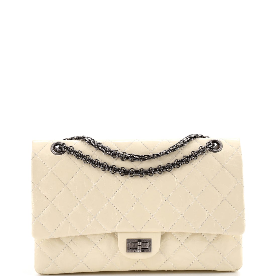 Chanel Reissue 2.55 Flap Bag Quilted Aged Calfskin: Height is what distinguishes this Reissue: 8 in tall on an 11 in width, with a 4 in base that makes it a genuine everyday carrier. Aged calfskin keeps the quilting matte rather than glossy. The chain 