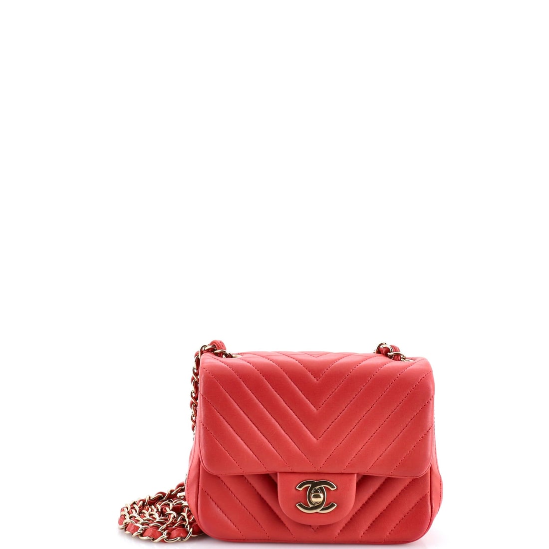 Chanel Square Classic Single Flap Bag Chevron Lambskin: Small-scale chevron work suits the square silhouette, giving the front panel movement while the flap itself stays flat. Interior space is one compartment behind the turnlock, bounded by a 6.5 inch wid