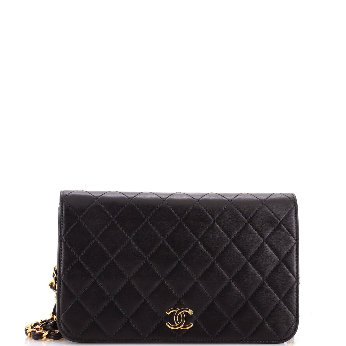 Chanel Vintage Full Flap Bag Quilted Lambskin: Three inches of depth on a 9.5 x 5.5 in frame turn the full flap into something that actually holds a day's contents. A 20 in chain sets the drop for crossbody or shoulder. Grade C - Very Good, worn b