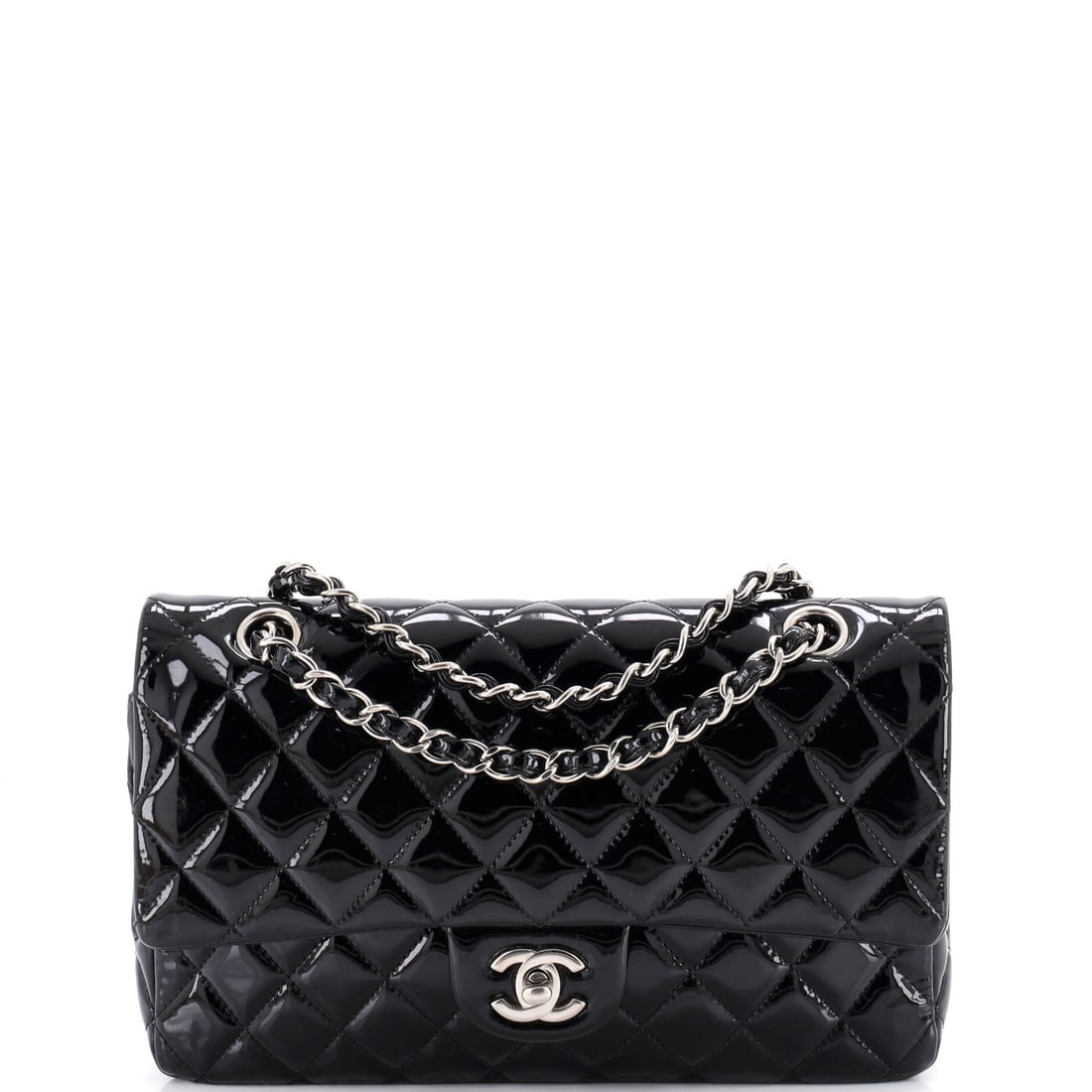 Chanel Classic Double Flap Bag Quilted Patent: Smaller than the jumbos in this sale at W 10 x H 6 x D 3 in, it keeps the full double-flap architecture on a frame that suits a narrower shoulder. The 9 in handle drop holds the bag close to the ribs,