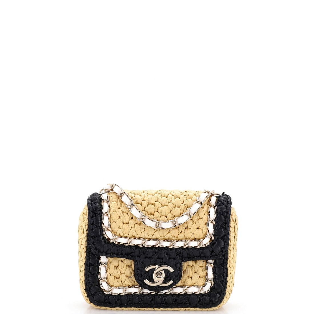 Chanel Venice Beach Square Flap Bag Braided Raffia: Braided raffia changes the read of a square flap entirely: lighter, more textural, unmistakably a warm-weather bag. The near-square 6.5 x 6 x 2.5 in body gives it a boxy stance that suits the material