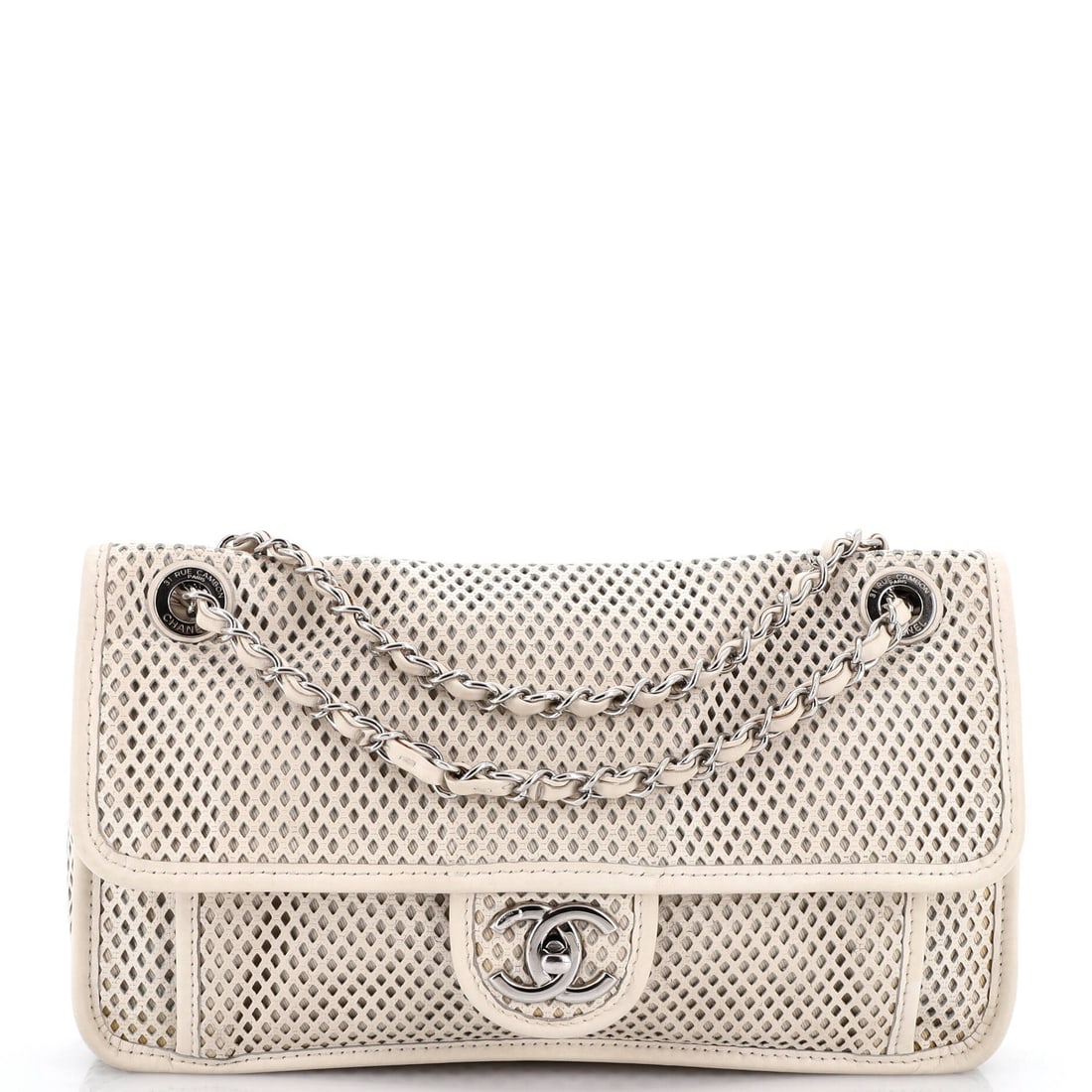 Chanel Up In The Air Flap Bag Perforated Leather: Perforated leather is what sets the Up In The Air flap apart, cut here on a generous 11.5 x 7 x 3 in body. A 10 in handle drop shoulders it easily and the 17 in chain brings it to the hip, so the bag 