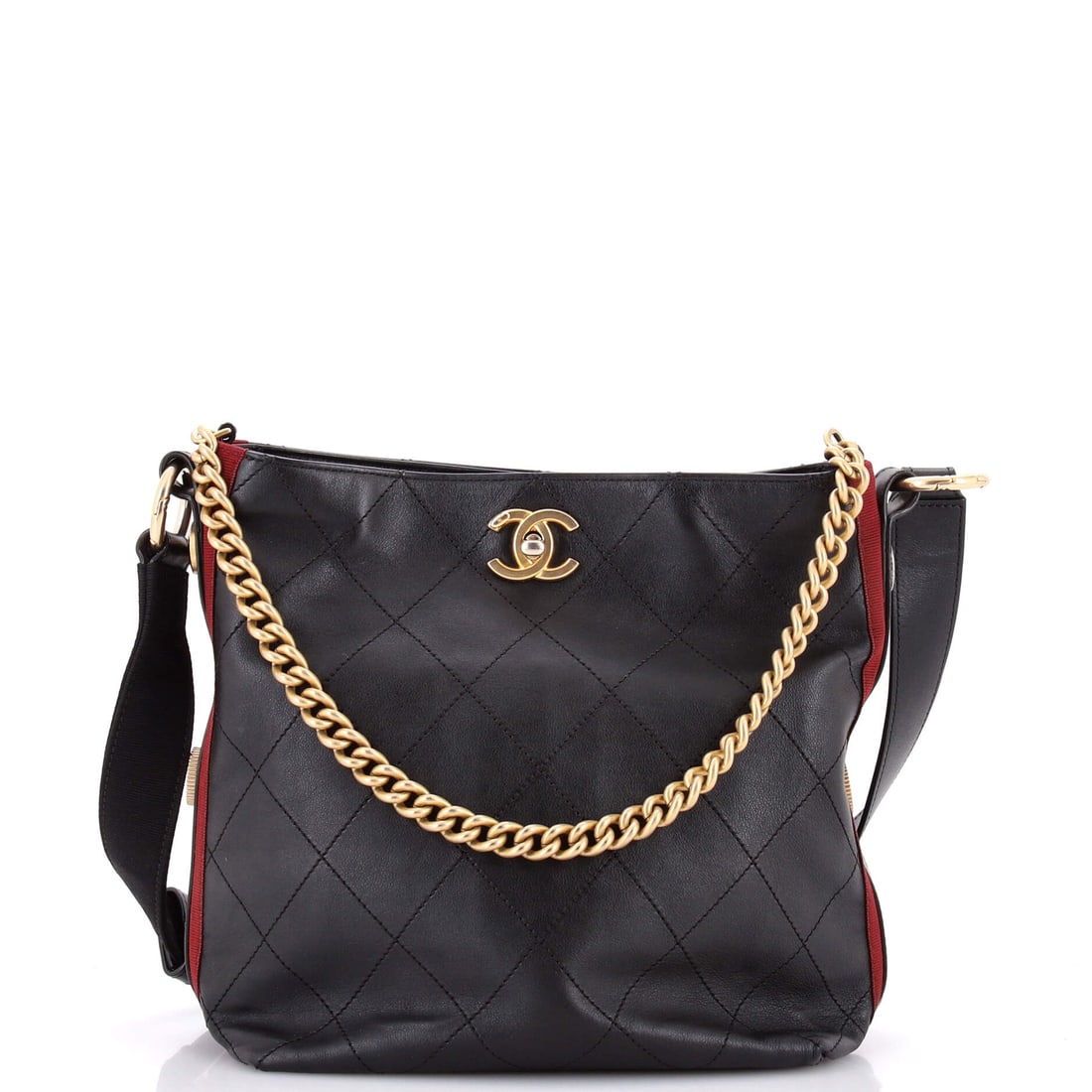 Chanel Button Up Hobo Quilted Calfskin with Grosgrain: Slouchier than most of what Chanel puts a chain on, the Button Up hobo runs W 9 x H 9.5 x D 5.5 in, taller than it is wide and deep enough to work as a genuine carryall. Grosgrain trim against quilted