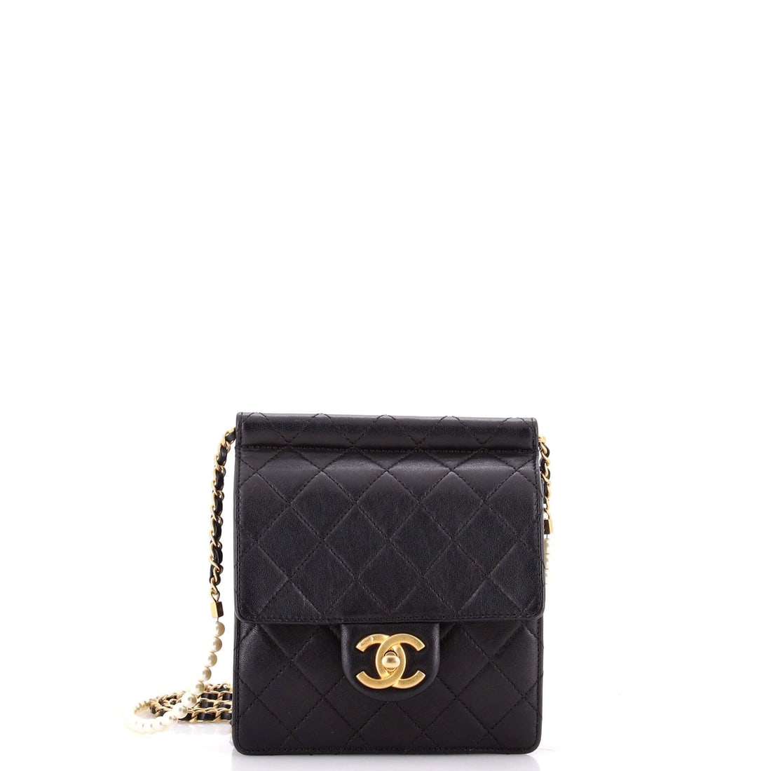 Chanel Pearl Chain Flap Bag Quilted Lambskin: A pearl chain carries this flap, and it changes the object's register entirely, less utility strap and more necklace. The body is unusually flat at 1.5 inches deep behind a six inch square front, so i