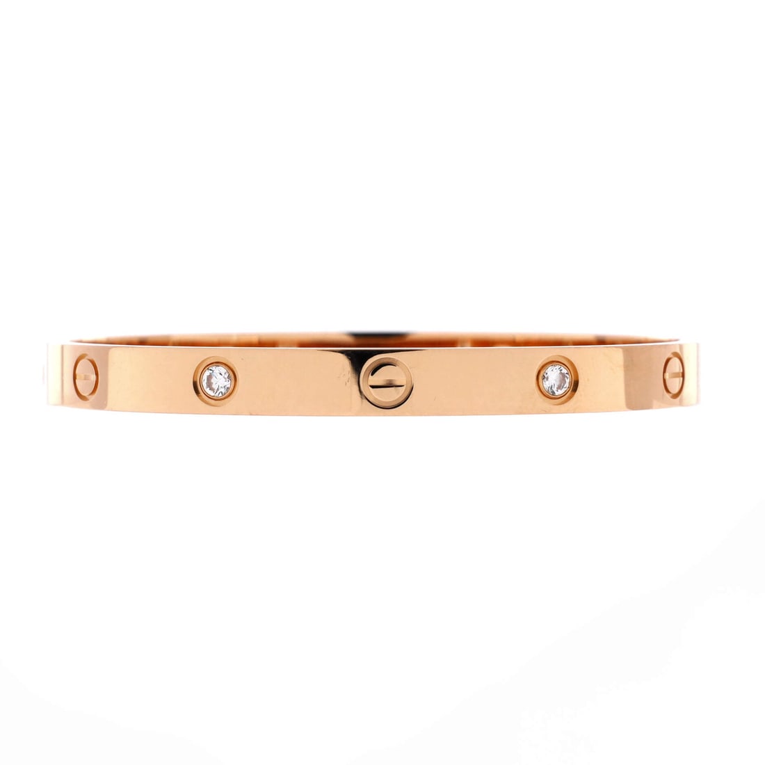 Cartier Love 4 Diamond Bracelet 18K Rose Gold with Diamonds: Four diamonds replace screw heads on this rose gold Love bangle, spaced around the band so at least one stays in view. The 6 mm width is the classic profile, enough metal to lead a wrist rather than f