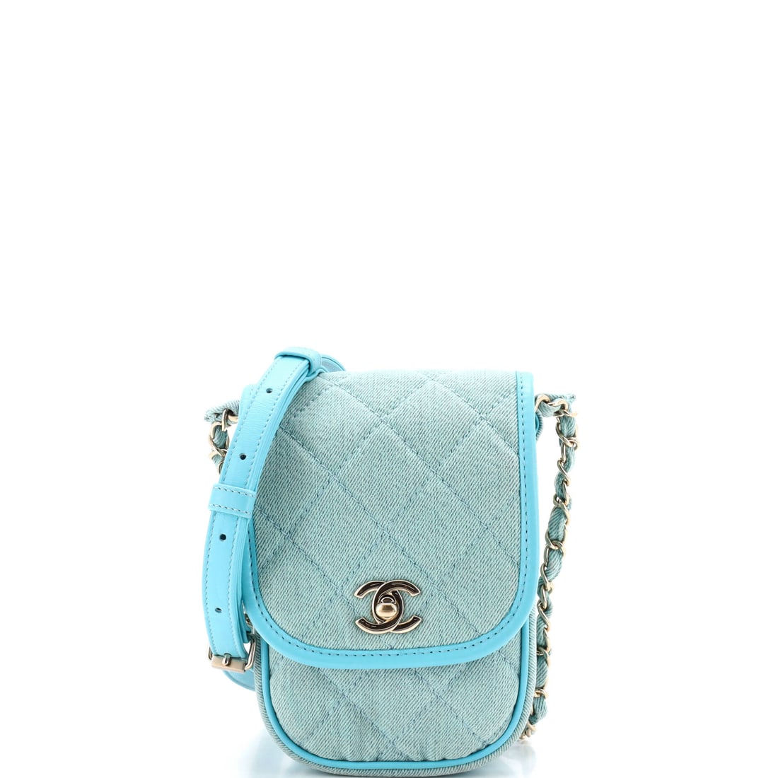 Chanel Flap Clutch with Chain Quilted Denim: At 4.5 by 7.5 inches this denim flap clutch stands upright rather than lying flat, and the 2.5-inch depth gives it real interior volume for the format. Quilted denim softens what would otherwise be a 