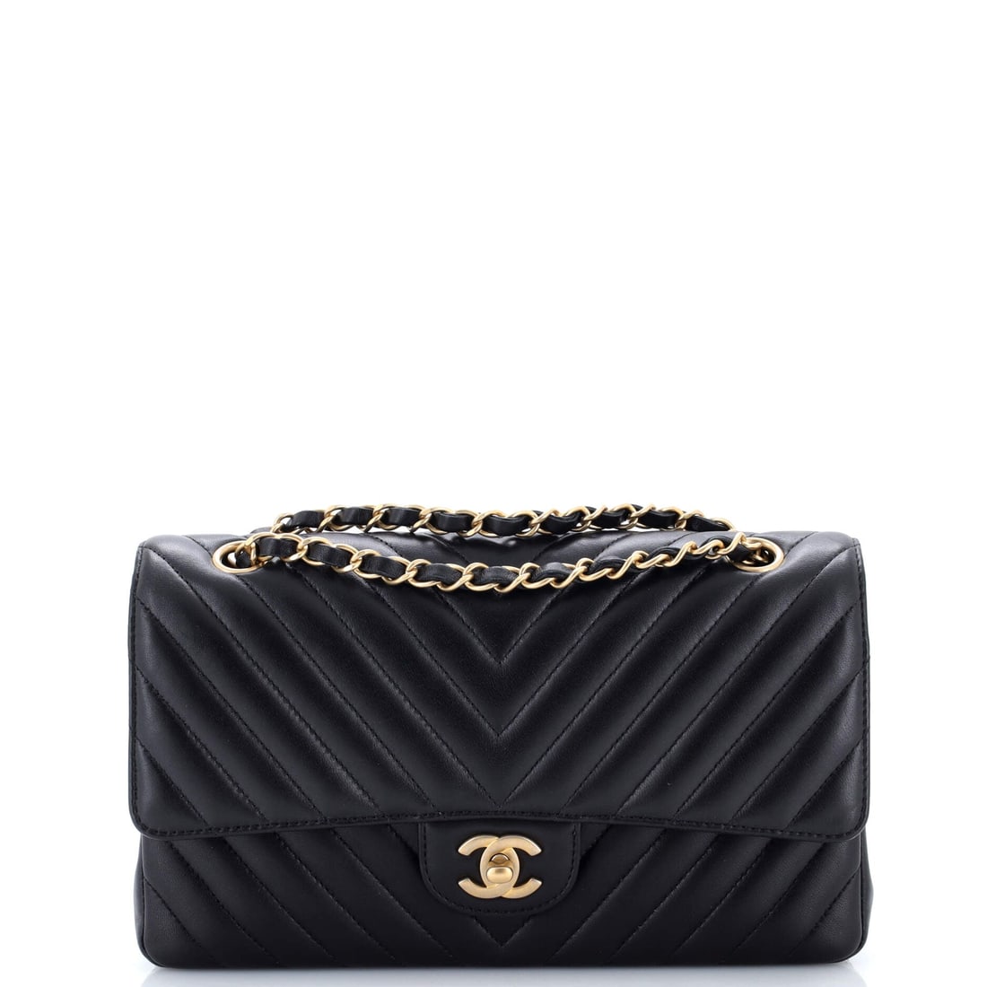 Chanel Classic Double Flap Bag Chevron Lambskin: Softness is the trade-off with lambskin, and it is also why this chevron flap feels like nothing else on the shoulder. The 10 by 6 inch body opens on the double flap, the second layer covering the zip