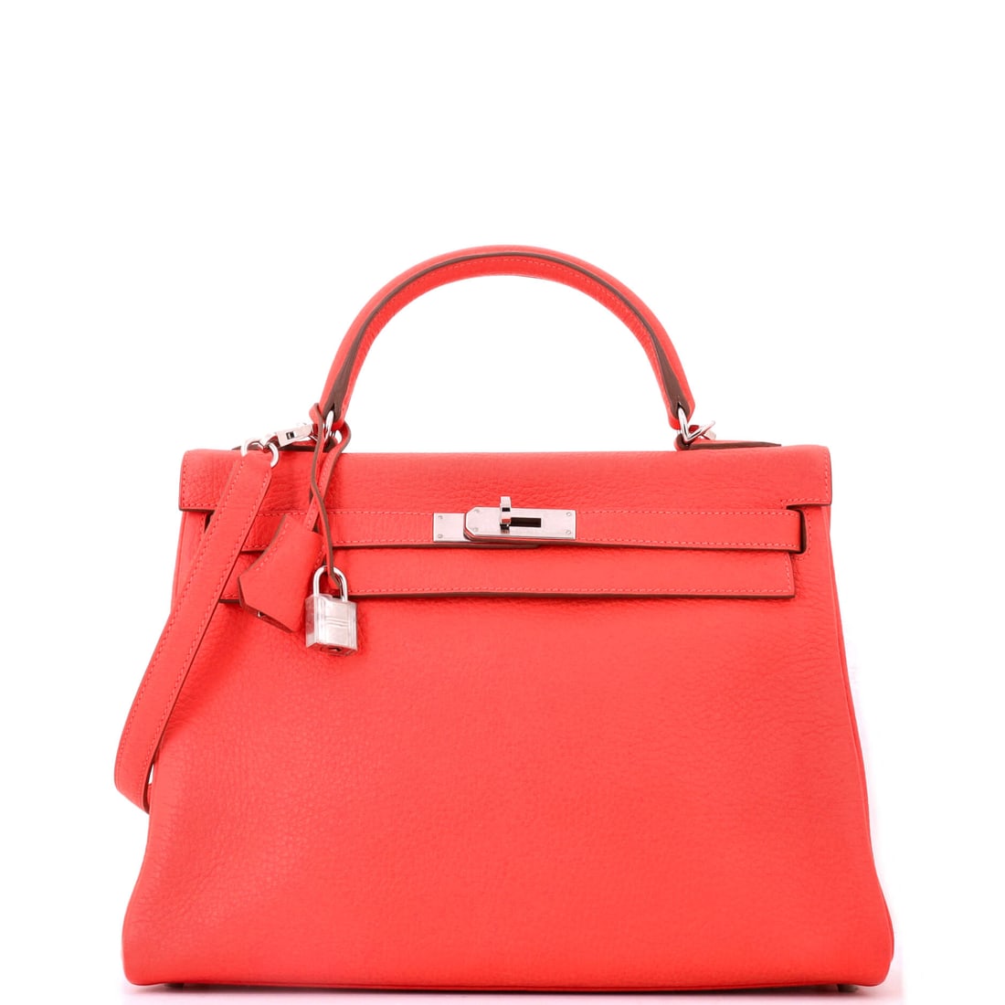 Hermes Kelly Handbag Pink Clemence with Palladium Hardware: Clemence slouches in a way stiffer leathers never will, and across a 12.5 in Kelly that means the sides ease slightly when the bag is loaded. Pink under palladium reads graphic rather than sweet, the 