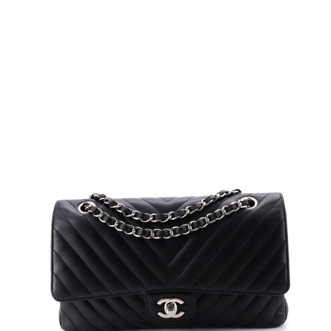 Chanel Classic Double Flap Bag Chevron Lambskin: Chanel's Classic in chevron lambskin at the medium 10 by 6 inch size, with a 3 inch gusset that swallows more than the flat front suggests. The strap adjusts between a 9 inch shoulder drop and a 17 in