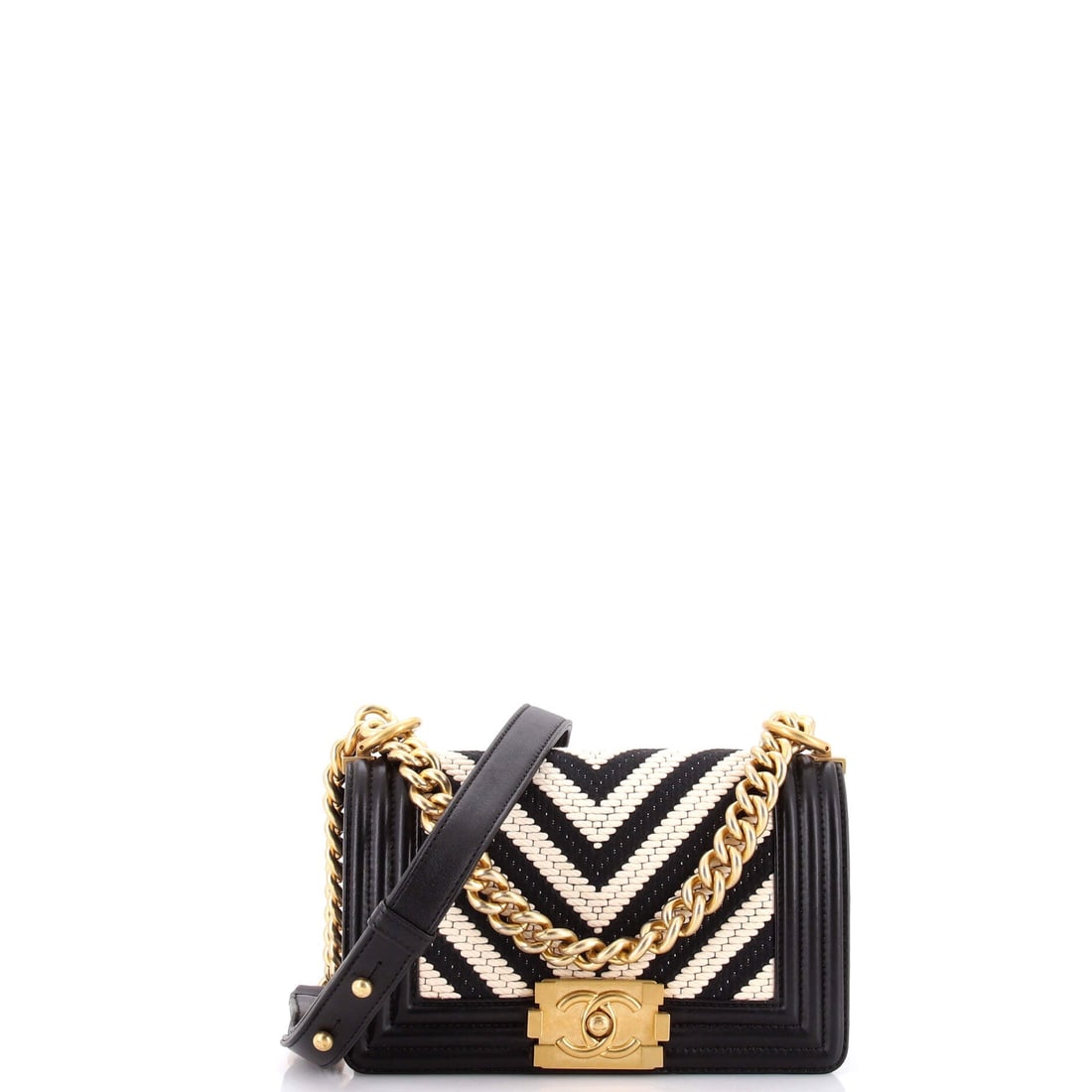 Chanel Boy Flap Bag Braided Chevron Cording and Calfskin: Cording braided through the chevron quilting gives this Boy a raised, ropey surface against smooth calfskin. The body runs 8 by 5 inches with 3 inches of room behind the flap, on a handle that drops 1