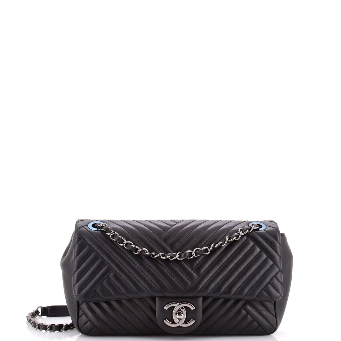 Chanel CC Crossing Flap Bag Chevron Lambskin: Chevron lambskin gives the CC Crossing flap a directional line the diamond quilt never does. Ten inches across and 6 high, it sits in full-size flap territory, and the 23 inch strap drop takes it cros
