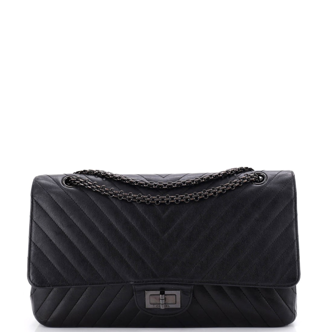 Chanel So Black Reissue 2.55 Flap Bag Chevron Sheepskin: Sheepskin gives this Reissue a softer, more matte body than calfskin, and the chevron lines fall with the leather rather than holding rigid. Large at 12.5 x 7.5 in with a 3.5 in base, it takes a folde