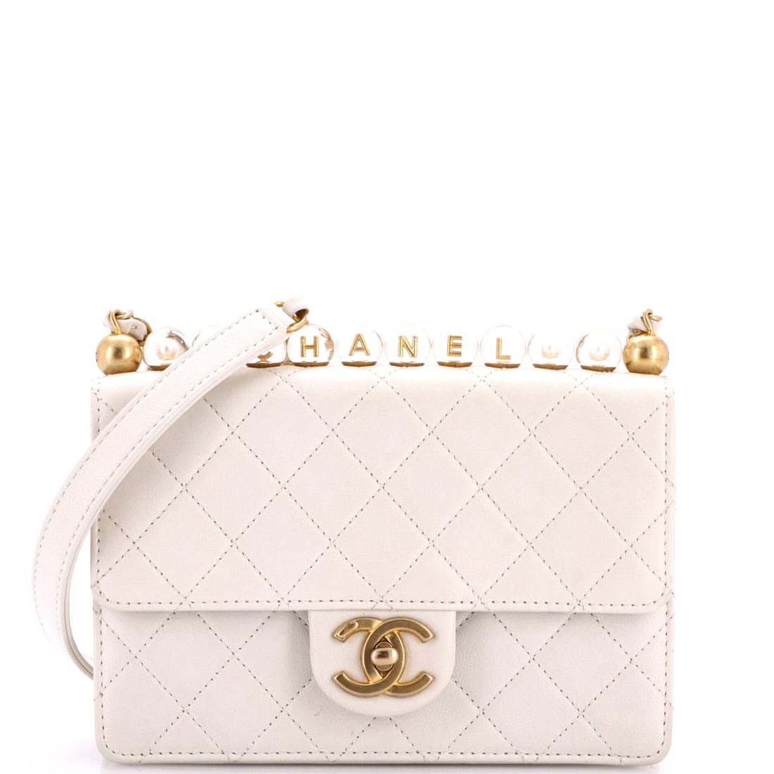 Chanel Chic Pearls Flap Bag Quilted Goatskin with Acrylic Beads: Small by design at 7.5 by 6 inches and just 2 inches deep, this Chic Pearls flap suits an evening rather than a workday. The bead strap drops 22 inches, long enough to wear across the body where the b