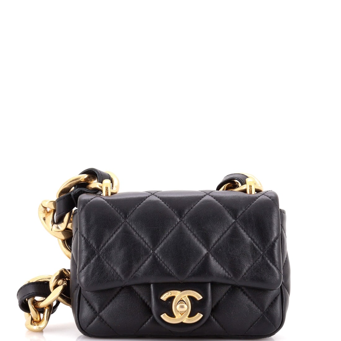 Chanel Funky Town Flap Bag Quilted Lambskin: Compact at 6.5 inches wide by 5 high and 2 deep, this Funky Town flap does phone, cards and a lipstick and stops there. The lambskin quilting is soft-handed and shows its age honestly, which the Grade