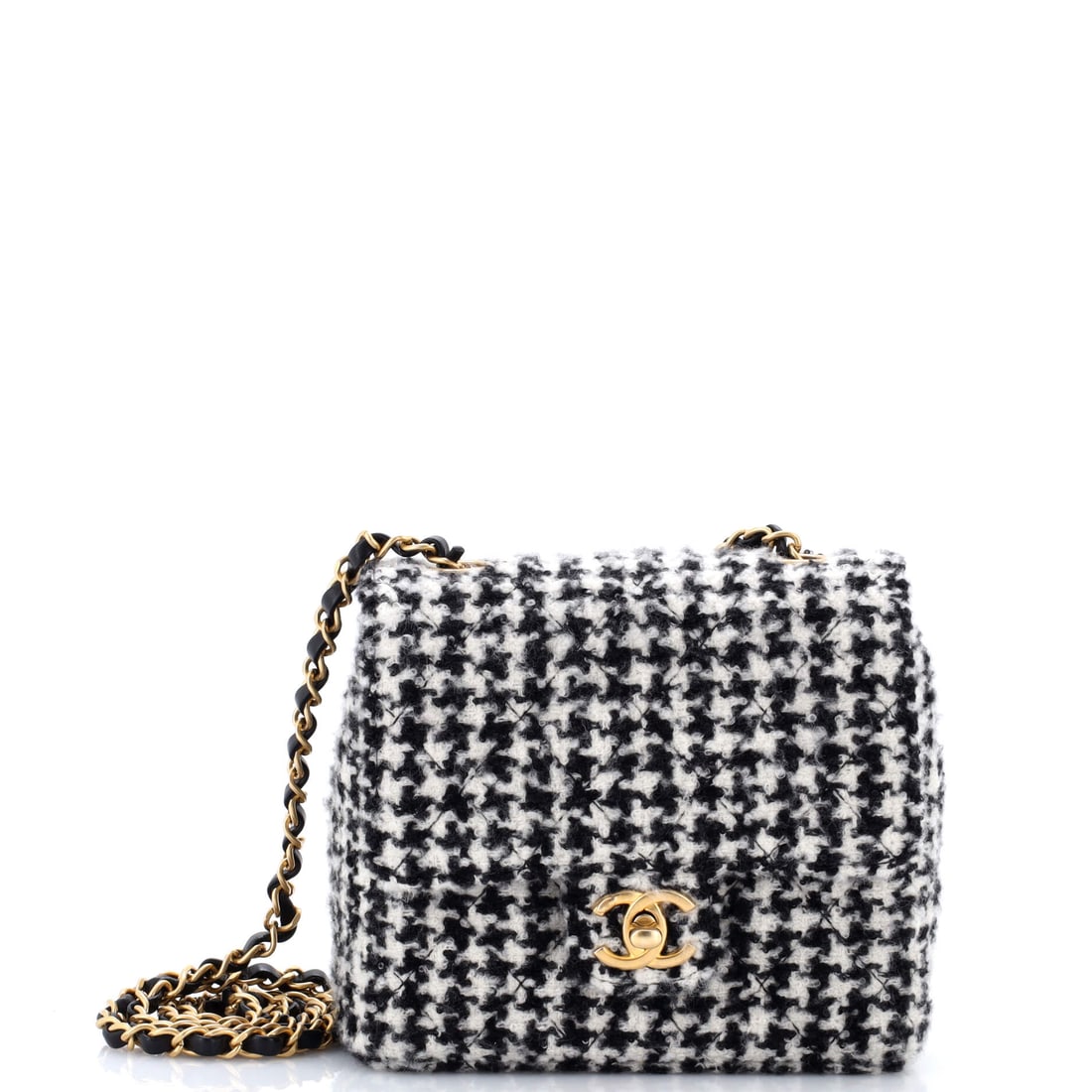 Chanel Square Classic Single Flap Bag Quilted Tweed: Tweed on a square flap changes the register entirely, trading leather's sheen for texture. The frame is small at 6 inches wide, 5 high and 3 deep. Grade C - Very Good, as tweed tends to show handling 