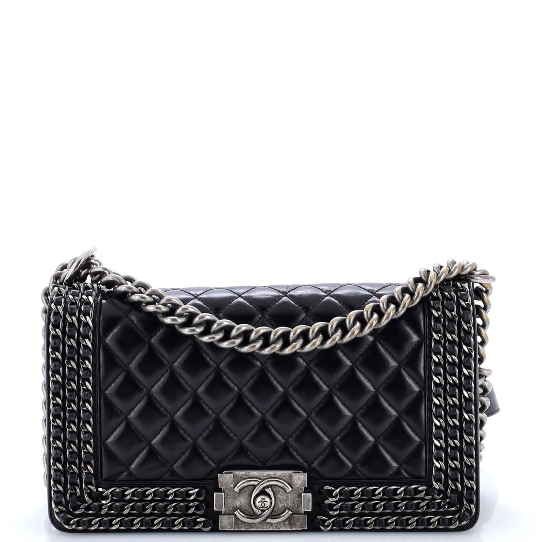 Chanel Chained Boy Flap Bag Quilted Glazed Calfskin: Scaled down a notch from its larger sibling, this Boy measures 10 by 6 by 3 inches, which keeps the chunky push-lock in proportion to the flap. Dual drops of 12 and 20.5 inches let it work on the shou