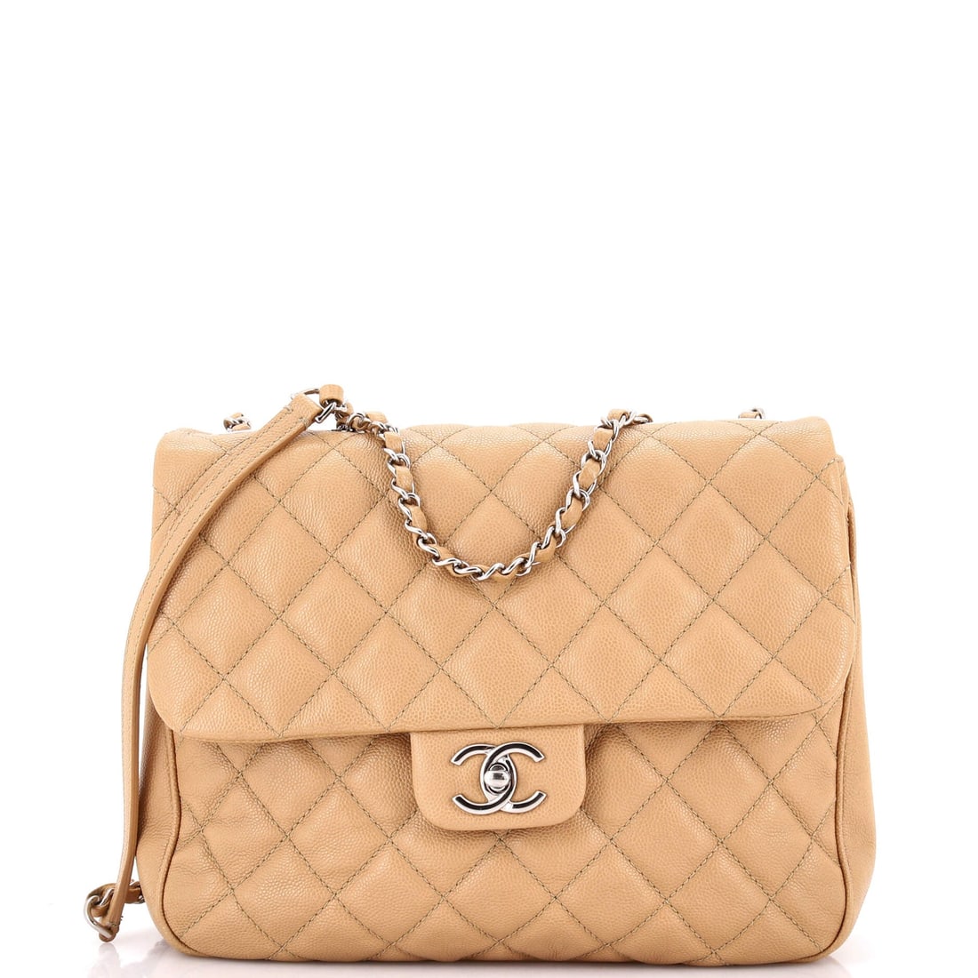 Chanel Urban Companion Flap Bag Quilted Caviar: Four inches of depth on a 10 x 8.5 in footprint make the Urban Companion the working end of the flap family, holding a day's contents upright. Shoulder it at 10.5 inches or wear it crossbody at 21, de