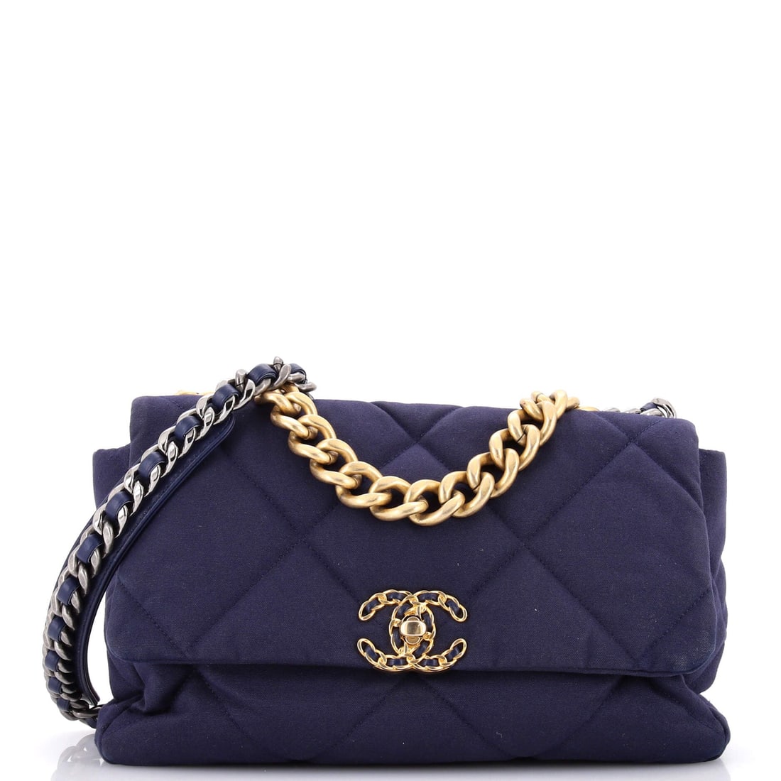 Chanel 19 Flap Bag Quilted Canvas: At twelve inches across, this canvas 19 is the wider of the day sizes, and the material keeps it manageable on the shoulder despite the footprint. Wear places it at Grade C - Very Good. Oversized quil