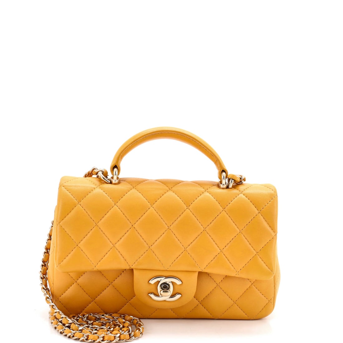 Chanel Classic Single Flap Top Handle Bag Quilted Lambskin: The top handle changes how this flap gets used, a 4 inch drop meant for hand carry while the 19 inch chain covers the shoulder. Quilted lambskin softens with time, and this one shows Grade C - Very Go