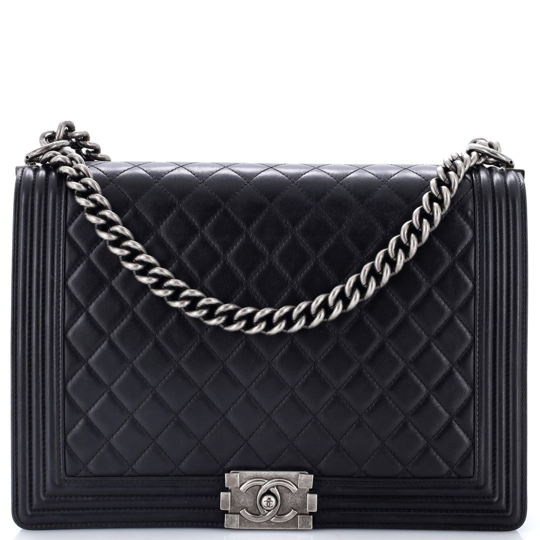 Chanel Boy Flap Bag Quilted Calfskin: Wider still at 12 by 8 by 3 inches, this quilted calfskin Boy is a day bag rather than a going-out flap, and the flat base means it stands upright when loaded. A 20-inch strap handles the volume acros