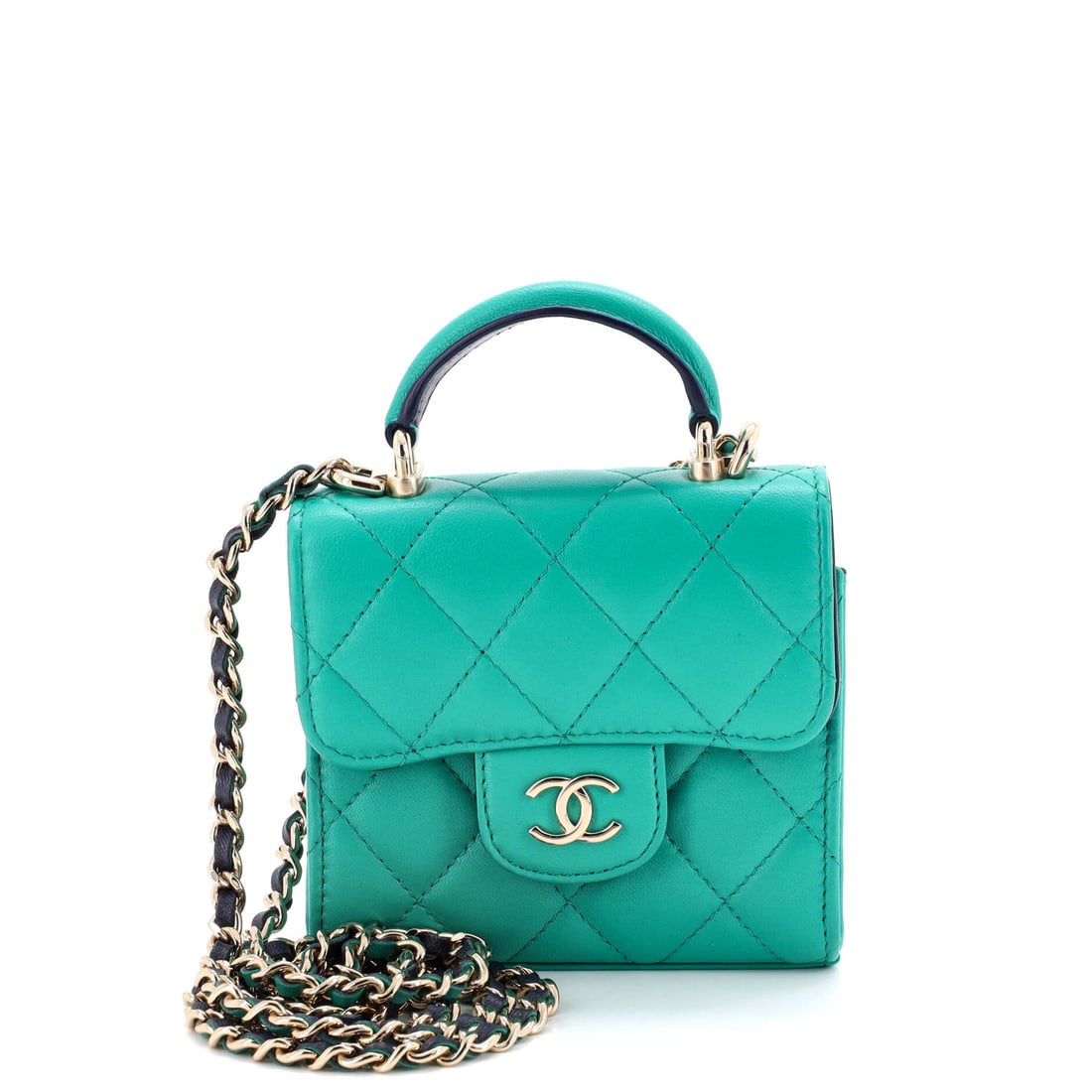 Chanel Square Classic Flap Top Handle Clutch with Chain Quilted Lambskin: Four and a half inches square, this top handle clutch is one of the smallest formats the classic flap takes, and the 24 in chain lets it be worn crossbody or dropped inside for hand carry. The 1.5 in 