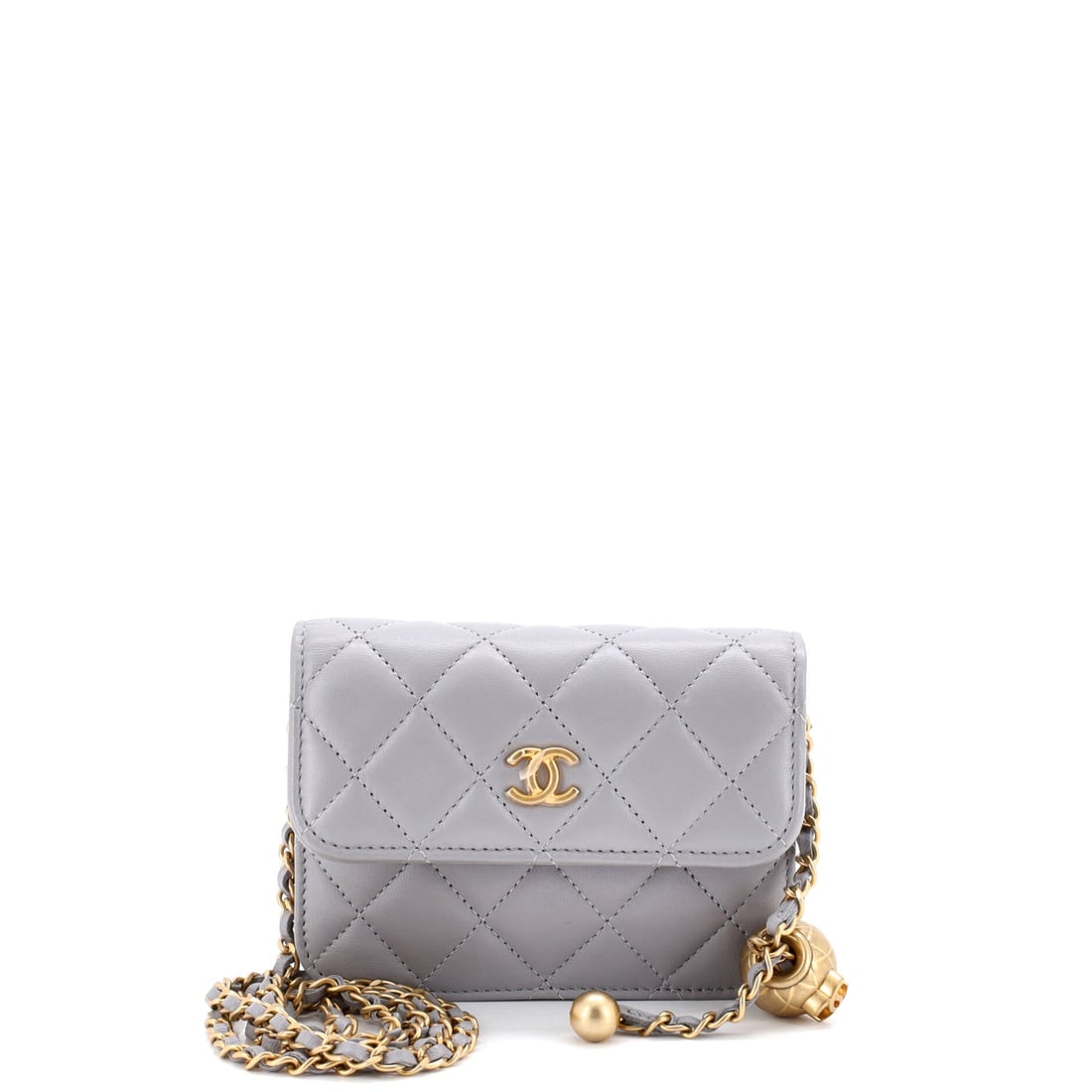 Chanel Pearl Crush Flap Clutch with Chain Quilted Lambskin: The flap and chain do all the structural work on a bag this small, 4.5 by 3.5 by one inch with nothing to spare. Quilted lambskin gives the front some give, so a phone sits without a bulge. Pearl deta