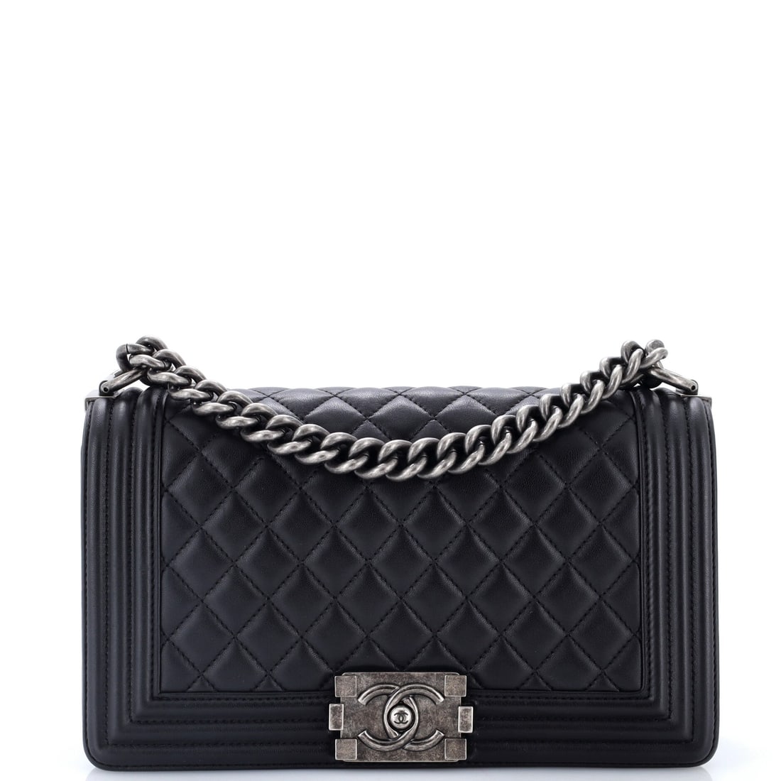 Chanel Boy Flap Bag Quilted Lambskin: Chain first: 20 inches long for across-the-body wear, 11 inches doubled, on a 10 by 6 by 3 inch quilted lambskin body that suits either. The interior is one lined compartment, which is what keeps a ba