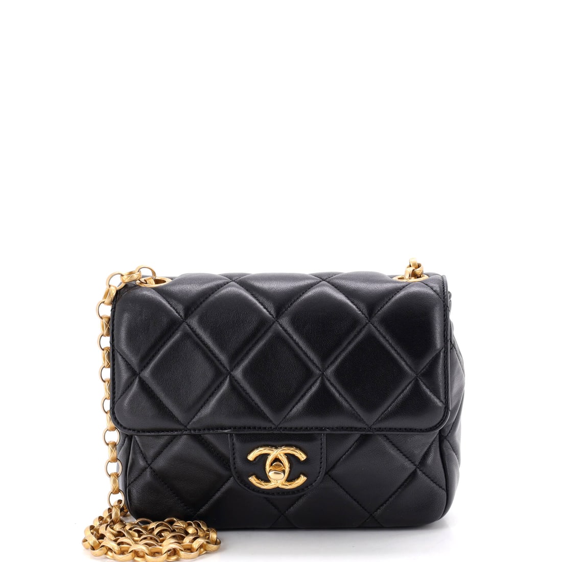 Chanel Medallion Chain Flap Bag Quilted Lambskin: Chanel's medallion charm hanging from the strap is the identifying detail on this quilted lambskin flap. With a 21.5 inch strap drop it wears crossbody, or shortens onto the shoulder for a tighter lin
