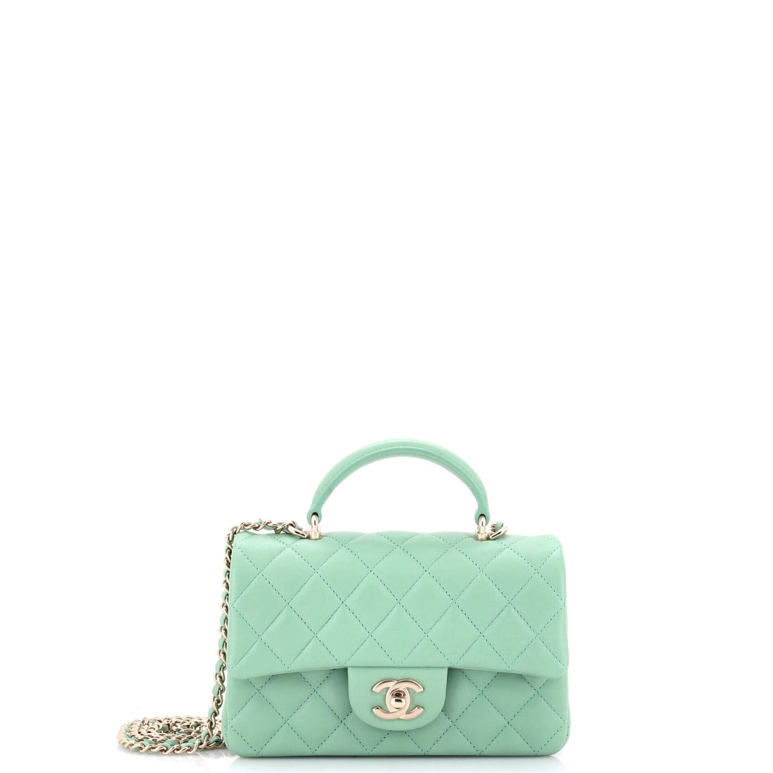 Chanel Classic Single Flap Top Handle Bag Quilted Lambskin: Hand-carry and chain-carry both work on this model, the 4 inch handle drop for the former and a 19 inch strap for the latter. Lambskin quilting reads plush at this 7.5 by 5 inch size, with 2.5 inches