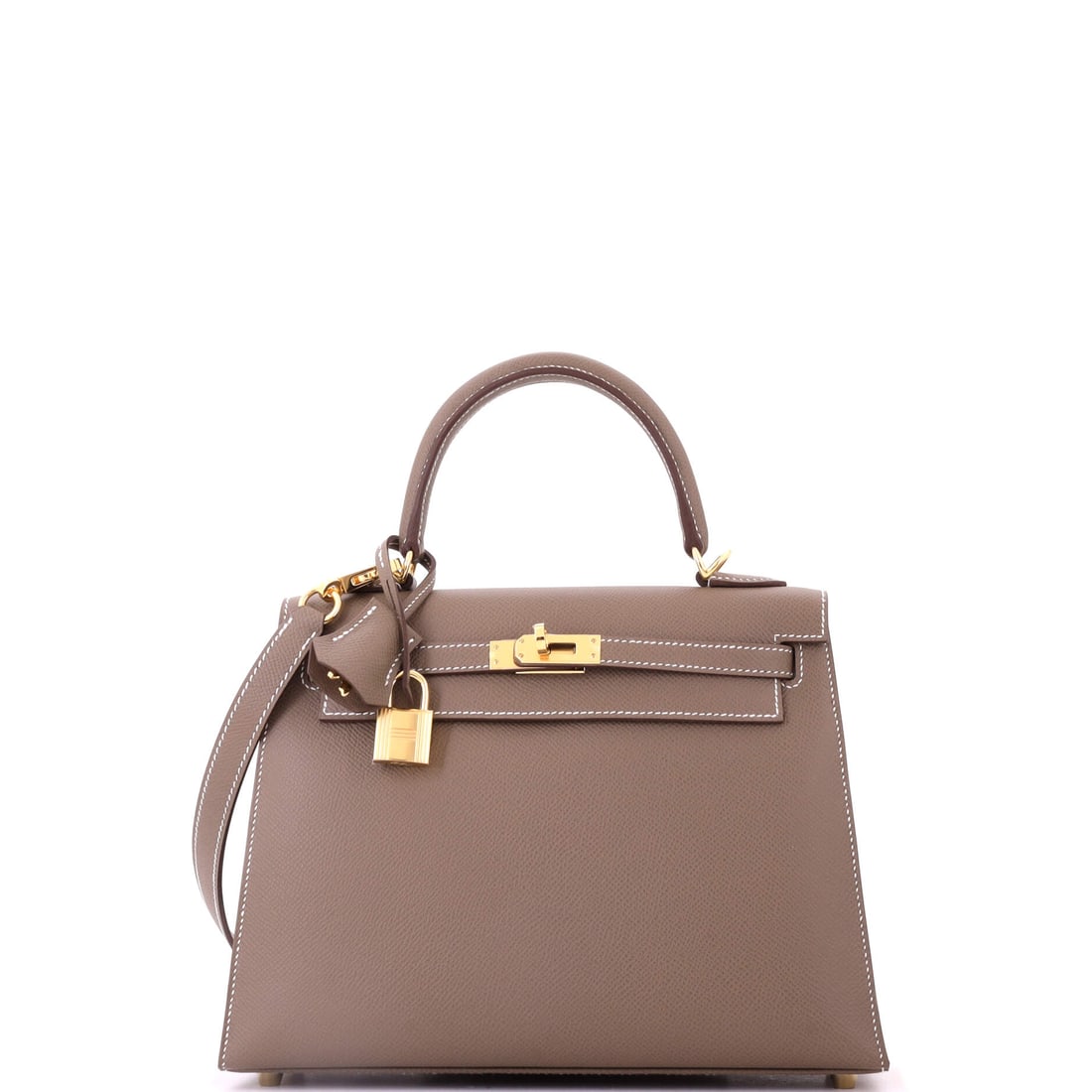 Hermes Kelly Handbag Grey Epsom with Gold Hardware: Grey Epsom with gold hardware gives a Kelly two things at once - a cool base color and a warm metal - and that tension is why the combination keeps selling. The embossed surface holds structure