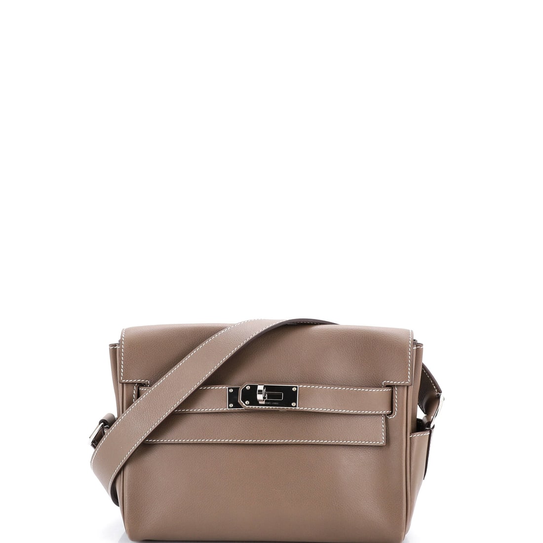 Hermes Kelly Messenger Bag Evercolor: The Kelly Messenger reworks the model as a crossbody, and Evercolor's matte, water-resistant surface suits a bag meant to be worn that way. Compact at 9.5 in wide, 7.5 in high and 4 in deep. Grade C -