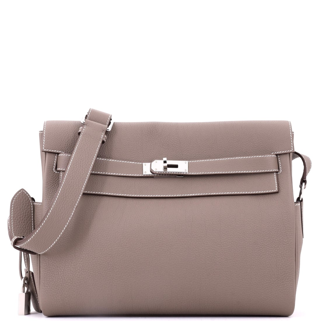 Hermes Kelly Messenger Bag Togo: A Kelly Messenger at 12.5 in wide is the larger version of the crossbody format, with 10.5 in of height and 5.5 in of depth giving it real capacity. Togo makes daily wear on the strap realistic. Grade