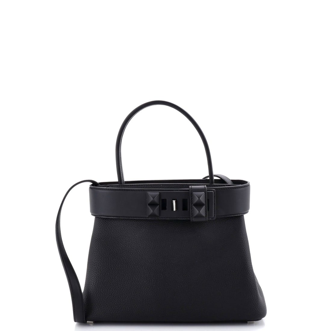 Hermes Medor Handbag Togo: The Medor's pyramid-stud clasp sits proud of the flap, which is why the model looks like nothing else Hermes makes. Togo gives the 10 in body durability under that hardware. Eight and a half inches hi