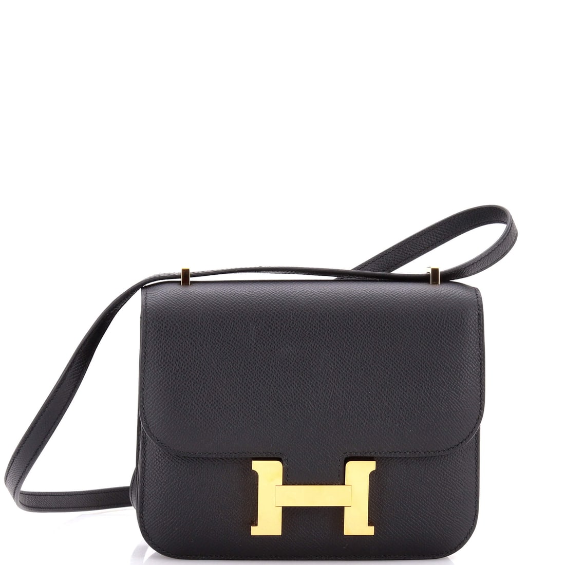Hermes Constance NM Bag Epsom: A Constance NM in Epsom at 8 in wide, 6 in high and 2 in deep. Slim, flat and defined entirely by the H clasp across the front. Grade B - Excellent. Maison de Beaubigonne authenticity guaranteed.