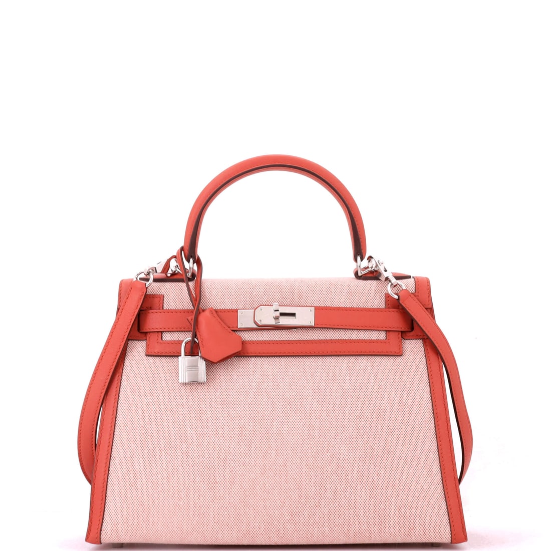 Hermes Kelly Handbag Toile and Brown Swift with Palladium Hardware: Toile with brown Swift is the canvas-and-leather combination Hermes uses to lighten a Kelly, both visually and in the hand. Palladium hardware, 11.5 in wide, 8.5 in high and 4 in deep. Canvas-bodied K