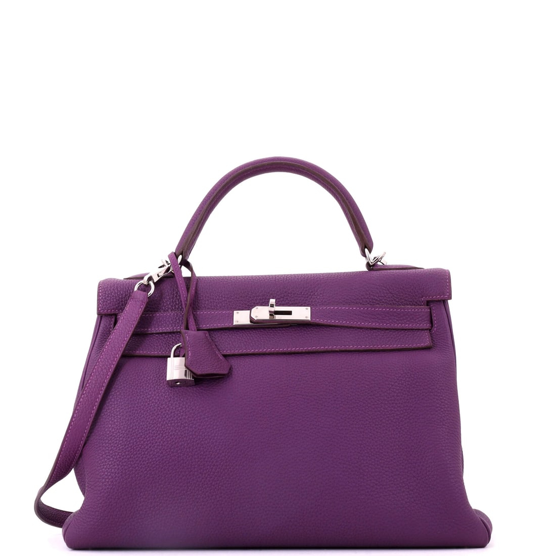 Hermes Kelly Handbag Purple Togo with Palladium Hardware: Purple Togo with palladium hardware in the wider 12.5 in Kelly, 9 in high and 4.5 in deep. An uncommon color at a size that carries flat under the arm. Grade C - Very Good. Maison de Beaubigonne