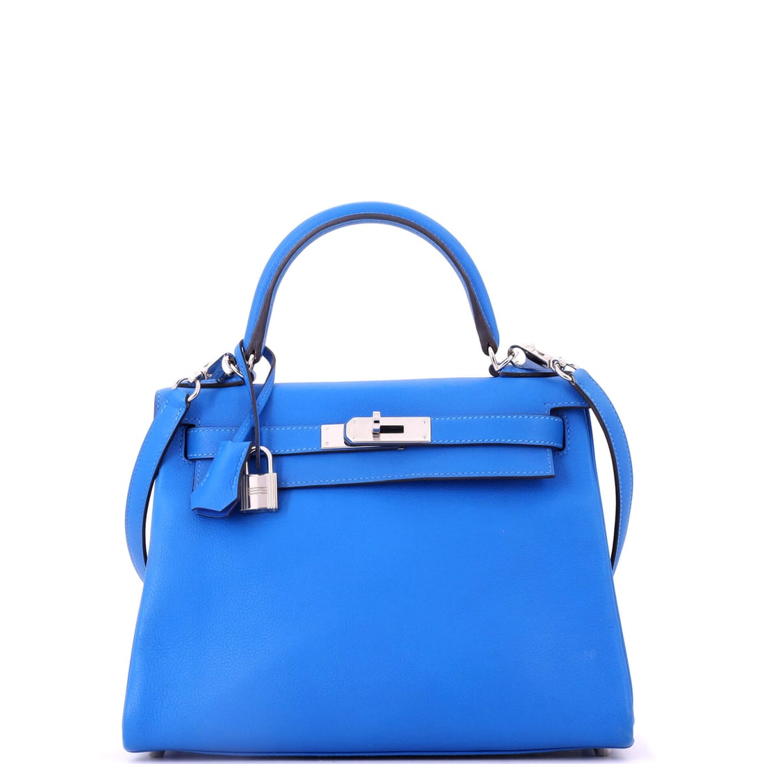 Hermes Kelly Handbag Blue Evercolor with Palladium Hardware: Evercolor gives blue a matte, chalky finish, and palladium hardware keeps the whole Kelly in one cool register. Ten and a half inches wide, 8.5 high, 4 deep. Grade C - Very Good. Maison de