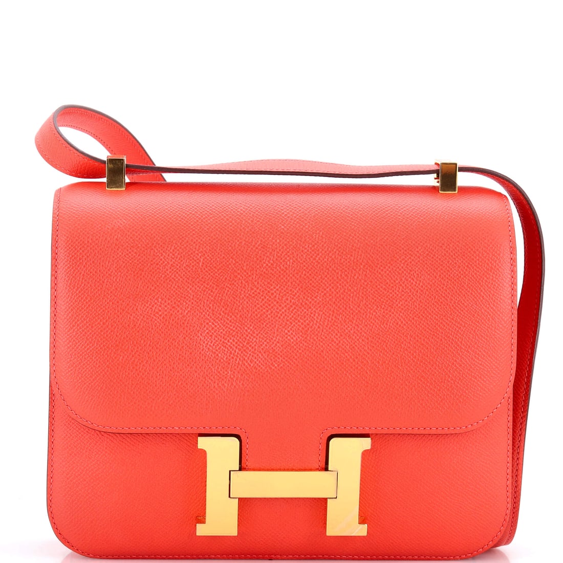 Hermes Constance Bag Epsom: The larger Constance in Epsom at 9 in wide, 8 in high and 3 in deep, with a 17 in strap drop. Enough capacity to work as a daily bag while keeping the H clasp as the whole design. Grade B - Excellent.