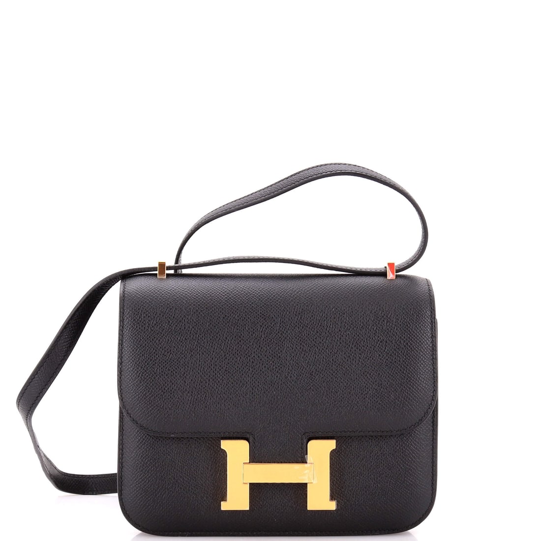 Hermes Constance NM Bag Epsom: Small Constance NM in Epsom - 7 in wide, 6 in high, 2 in deep. The whole front is given over to the H clasp, which is the reason the model has climbed the way it has. Grade B - Excellent. Maison de Be