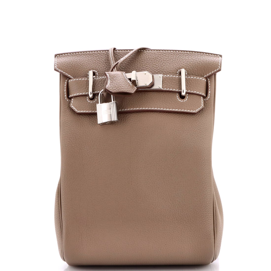 Hermes Hac a Dos Backpack Togo: Hermes makes very few backpacks, and the Hac a Dos is the one that traces back to the Haut a Courroies. Narrow at 7 in wide by 11 in high by 3 in deep, in Togo, so it stands upright rather than slumpi