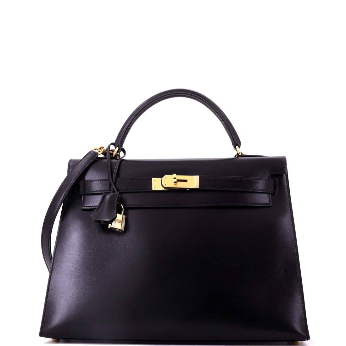 Hermes Kelly Handbag Black Box Calf with Gold Hardware: Box calf gives this Kelly a mirror-smooth black face and gold hardware gives it the only warmth on the bag. Twelve inches wide, 9 high, 4 deep. The most formal reading the model offers. Grade C - Very